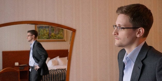 MOSCOW, RUSSIA - DECEMBER 2013: (EXCLUSIVE ACCESS; PREMIUM RATES (3X) APPLY) Former intelligence contractor Edward Snowden poses for a photo during an interview in an undisclosed location in December 2013 in Moscow, Russia. Snowden who exposed extensive details of global electronic surveillance by the National Security Agency has been in Moscow since June 2012 after getting temporary asylum in order to evade prosecution by authorities in the U.S. (Photo by Barton Gellman/Getty Images)