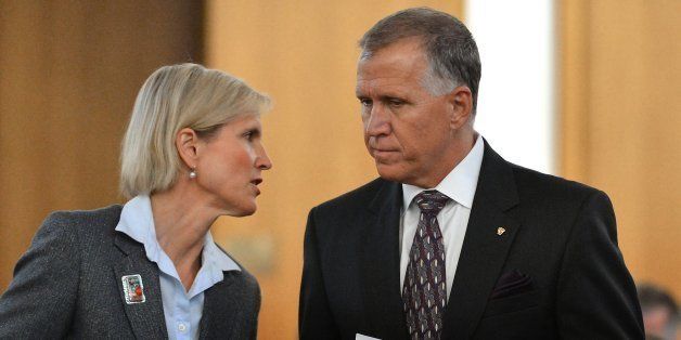 Representative Ruth Samuelson, left, (R-Charlotte), has a discussion with Speaker of the House Rep. Thom Tillis before she introduces an abortion bill in the North Carolina House of Representatives in Raleigh, North Carolina, on Thursday July 11, 2013. (Chuck Liddy/Charlotte Observer/MCT via Getty Images)