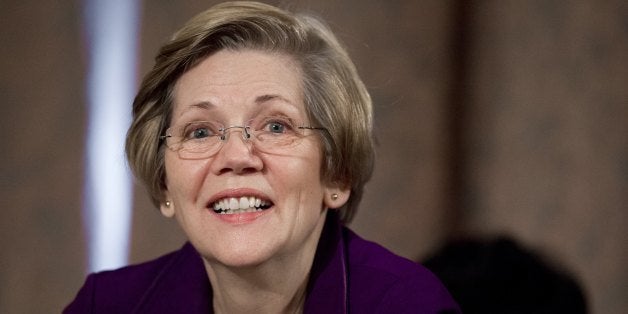 US Democratic Senator Elizabeth Warren of Massachusetts attends a Senate Banking, Housing and Urban Affairs Committee hearing on Capitol Hill, on February 27, 2014. AFP PHOTO / Saul LOEB (Photo credit should read SAUL LOEB/AFP/Getty Images)