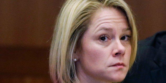 TRENTON, NJ - MARCH 11: New Jersey Gov. Chris Christie's former Deputy Chief of Staff Bridget Anne Kelly waits in court during a hearing on March 11, 2014 in Trenton, New Jersey. The hearing will decide whether Kelly and two-time campaign manager Bill Stepien will be forced to turn over text messages and private communications to investigating New Jersey legislators in the political payback bridge scandal looming over the Christie administration. (Photo by Mel Evans-Pool/Getty Images)