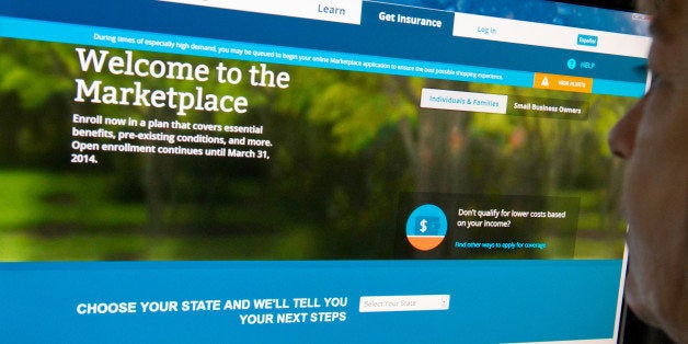 This December 2, 2013 photo shows a woman reading the HealthCare.gov insurance marketplace internet site in Washington, DC. The troubleshooter appointed by President Barack Obama to overhaul a bungled health care website rollout said Sunday that improvements had made a 'night and day' difference in handling online traffic. The White House has admitted previously that the launch of Healthcare.gov, where people can sign up for health insurance, was a debacle and the Obama administration pledged that the vast majority of potential customers would be able to enroll online by the end of November. AFP PHOTO / Karen BLEIER (Photo credit should read KAREN BLEIER/AFP/Getty Images)