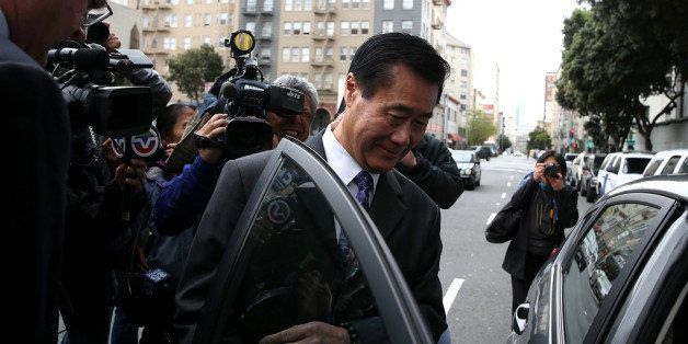 SAN FRANCISCO, CA - MARCH 31: California State Sen. Leland Yee gets into an awaiting car as he leaves the Phillip Burton Federal Building after a court appearance on March 31, 2014 in San Francisco, California. Yee appeared in federal court today for a second time after being arrested along with 25 others by F.B.I. agents last week on political corruption and firearms trafficking charges. Yee is free on a $500,000 unsecured bond. (Photo by Justin Sullivan/Getty Images)