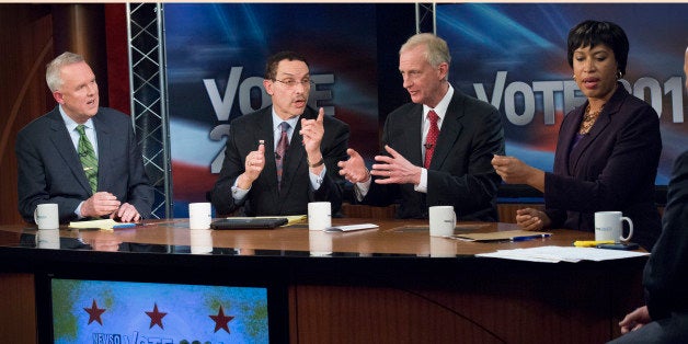 ARLINGTON, VA - MARCH 13: DC Democratic Mayoral Candidates (L-R) Tommy Wells, Vincent Gray, Jack Evans and Muriel Bowser during a debate live at News Channel 8 in Arlington, VA on March 13, 2014. A large portion of the debate centered around federal campaign funding corruption charges in Mayor Gray's previous campaign for mayor. (Photo by Linda Davidson / The Washington Post via Getty Images)