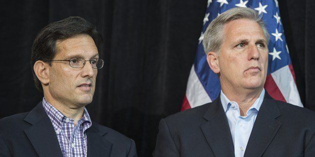 Majority Leader US Congressman Eric Cantor (L), R-Virginia, and Majority Whip US Congressman Kevin McCarthy (R), R-California, attend the House Republican Leadership press conference at the House Republican Issues Conference in Cambridge, Maryland, January 30, 2014. AFP PHOTO / Jim WATSON (Photo credit should read JIM WATSON/AFP/Getty Images)
