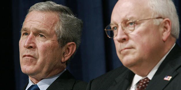 Washington, UNITED STATES: US President George W. Bush (L) and Vice President Dick Cheney watche as Robert Gates delivers remarks after being sworn-in as the 22nd US defense secretary during a ceremony at the Pentagon 18 December 2006 in Washington, DC. Gates is replacing Donald Rumsfeld who resigned a day after a Republican thrashing in mid-term elections that were seen as a referendum on the war in Iraq. AFP PHOTO/Mandel NGAN (Photo credit should read MANDEL NGAN/AFP/Getty Images)