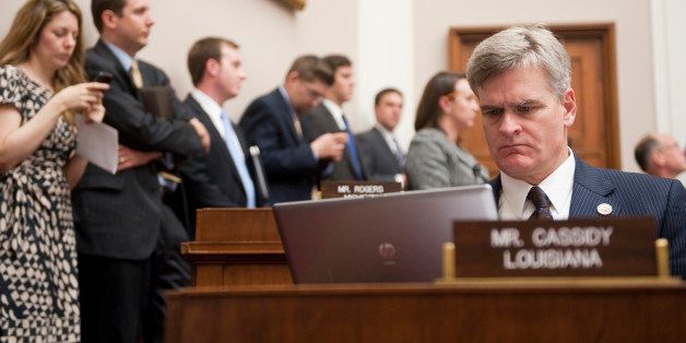 UNITED STATES ? NOVEMBER 30: Rep. Bill Cassidy, R-La., works on his laptop during theHouse Energy and Commerce Committee markup of the 'Farm Dust Regulation Prevention Act of 2011,' on Wednesday, Nov. 30, 2011. (Photo By Bill Clark/CQ Roll Call)