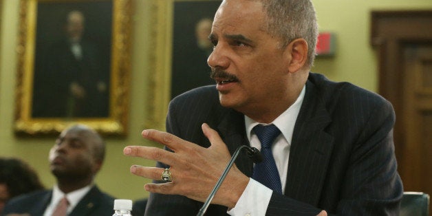 WASHINGTON, DC - APRIL 04: Attorney General Eric Holder testifies during a House Appropriations Committee hearing on Capitol Hill, on April 4, 2014 in Washington, DC. The committee was hearing testimony from Holder the Department of Justice FY2015 budget request and other Justice Department related issues. (Photo by Mark Wilson/Getty Images)