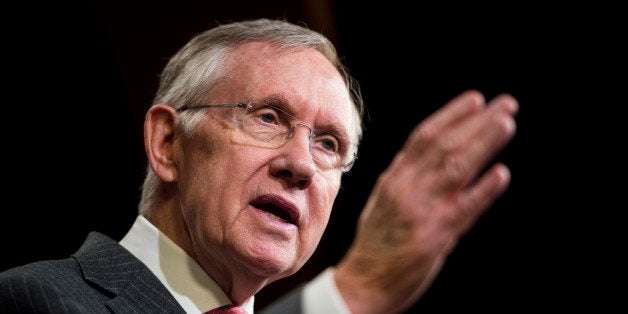 UNITED STATES - MARCH 26: Senate Majority Leader Harry Reid, D-Nev., speaks during the Senate Democrats' news conference to u