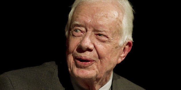 AUSTIN, TX - APRIL 8: Former President Jimmy Carter sits down for a conversation with Mark Updegrove, Director of the LBJ Presidential Library, on the first day of the Civil Rights Summit at the LBJ Presidential Library April 8, 2014 in Austin, Texas. The summit is marking the 50th anniversary of the passing of the Civil Rights Act legislation, with U.S. President Barack Obama making the keynote speech on April 10. (Photo by Ralph Barrera-Pool/Getty Images)