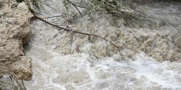 View of the currents of caused by the rains in the Melchor de Mencos municipality, Peten departament, in the border with Belize, 587 km northeast of Guatemala City, on August 4, 2016.Hurricane Earl was downgraded to a tropical storm Thursday after hitting Central America with 130 kilometer (80 mile) per hour winds, but fears of flooding lingered as heavy rain lashed the region. / AFP / JOHAN ORDONEZ (Photo credit should read JOHAN ORDONEZ/AFP/Getty Images)