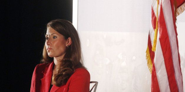 LOUISVILLE, KY - FEBRUARY 25: Kentucky Democratic Senate Candidate Alison Lundergan Grimes listens as Former U.S. President Bill Clinton delivers remarks during a campaign event at the Galt House Hotel on February 25, 2014 in Louisville, Kentucky. Grimes is challenging Senate Minority Leader Mitch McConnell (R-KY) in the 2014 midterm elections. (Photo by Luke Sharrett/Getty Images)
