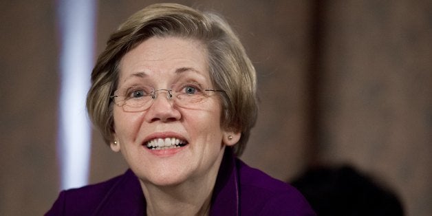 US Democratic Senator Elizabeth Warren of Massachusetts attends a Senate Banking, Housing and Urban Affairs Committee hearing on Capitol Hill, on February 27, 2014. AFP PHOTO / Saul LOEB (Photo credit should read SAUL LOEB/AFP/Getty Images)