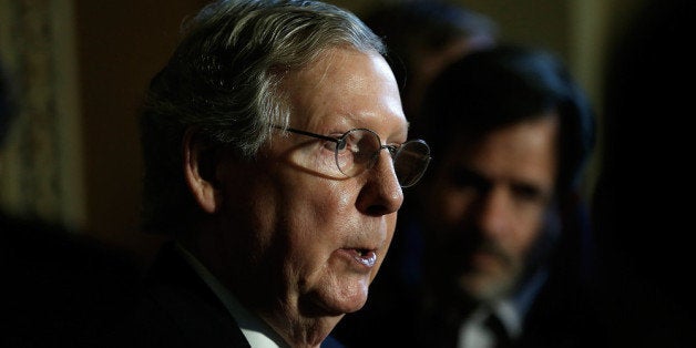 WASHINGTON, DC - APRIL 08: Senate Minority Leader Mitch McConnell (R-KY) speaks with reporters following the weekly policy luncheon for Senate Democrats April 8, 2014 in Washington, DC. Senate Democrats and Republicans are currently discussing legislation proposed by each side to alleviate a gap in wages between men and women. (Photo by Win McNamee/Getty Images)