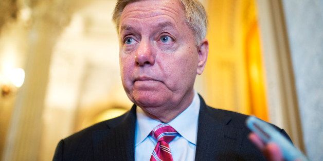 UNITED STATES - JANUARY 07: Sen. Lindsey Graham, R-S.C., talks with reporters in the Capitol during a vote in which the Senate passed cloture on a motion to proceed on a bill that would expand unemployment benefits for three months. (Photo By Tom Williams/CQ Roll Call)