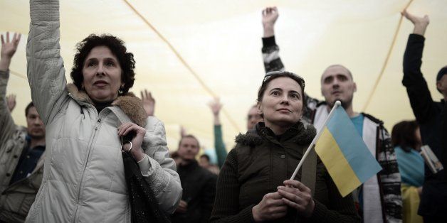 DONETSK, UKRAINE - APRIL 17: Ukrainian demonstrators take part in a protest to support Ukrainian city Donetsk in a park Donetsk, eastern Ukraine, on April 17, 2014. (Photo by Burak Akbulut/Anadolu Agency/Getty Images)