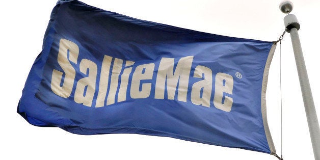 UNITED STATES - APRIL 16: A flag flies outside a Sallie Mae building in Reston, Virginia, a suburb of Washington D.C., Monday, April 16, 2007. SLM Corp., known as Sallie Mae, accepted a $25 billion takeover bid from a group led by J.C. Flowers & Co., taking private the largest U.S. provider of student loans. (Photo by Carol T. Powers/Bloomberg via Getty Images)