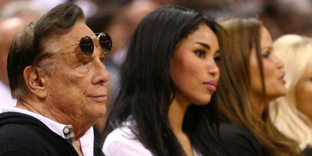 SAN ANTONIO, TX - MAY 19: (2nd L) Team owner Donald Sterling of the Los Angeles Clippers watches the San Antonio Spurs play against the Memphis Grizzlies during Game One of the Western Conference Finals of the 2013 NBA Playoffs at AT&T Center on May 19, 2013 in San Antonio, Texas. NOTE TO USER: User expressly acknowledges and agrees that, by downloading and or using this photograph, User is consenting to the terms and conditions of the Getty Images License Agreement. (Photo by Ronald Martinez/Getty Images) 