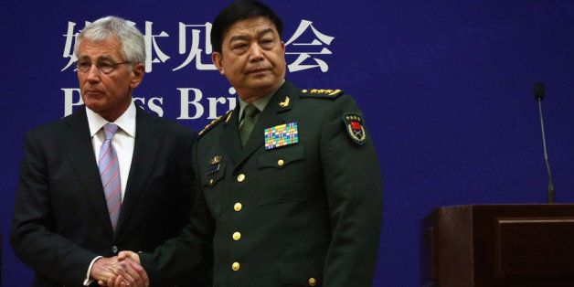 BEIJING, CHINA - APRIL 08: U.S. Secretary of Defense Chuck Hagel (L) and Chinese Minister of Defense Chang Wanquan (R) shake hands at the end of a joint news conference at the Chinese Defense Ministry headquarters April 8, 2014 in Beijing, China. Secretary Hagel is on the second stop of an Asian trip, the fourth time since he took office, to Japan, China and Mongolia. (Photo by Alex Wong/Getty Images)