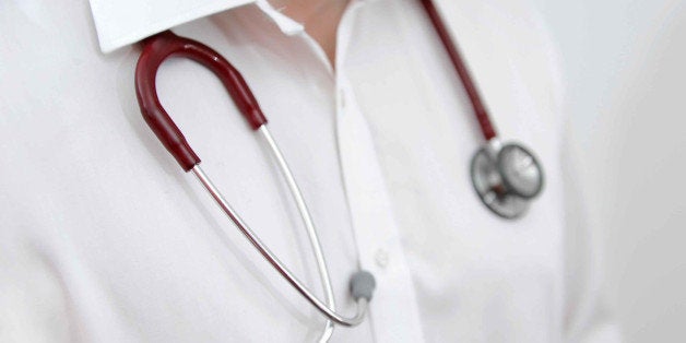 File photo dated 25/1/2013 of a man with a stethoscope around his neck. Almost three quarters of junior doctors feel that the