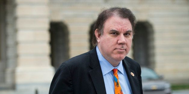 UNITED STATES - APRIL 4: Rep. Alan Grayson, D-Fla., leaves the Capitol following the last vote of the week on Friday, April 4, 2014. (Photo By Bill Clark/CQ Roll Call)