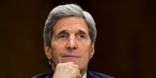 WASHINGTON, DC - APRIL 08: U.S. Secretary of State John Kerry testifies during a Senate Foreign Relations Committee hearing concerning the 2015 international affairs budget on Capitol Hill April 8, 2014 in Washington, DC. Kerry discussed a wide range of topics, including the conflict in Syria, relations with Iran, and also discussed the possibility of additional economic sanctions on Russia. (Photo by Drew Angerer/Getty Images)