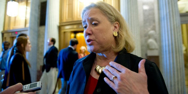 UNITED STATES - June 4: Sen. Mary Landrieu, D-LA., talks to reporters as she walks to the weekly Senate policy luncheons in t