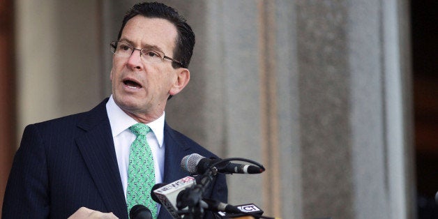 HARTFORD, CT - FEBRUARY 14: The Connecticut Gov. Dan Malloy speaks at a rally at the Connecticut State Capital to promote gu
