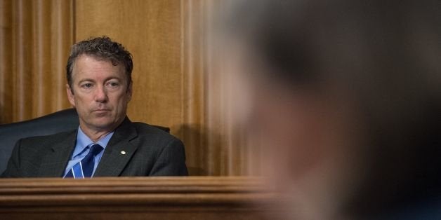 US Republican Senator from Kentucky Rand Paul looks on during a Senate Foreign Relations Committee hearing on the situation in Ukraine on Capitol Hill in Washington on May 6, 2014. AFP PHOTO/Nicholas KAMM (Photo credit should read NICHOLAS KAMM/AFP/Getty Images)