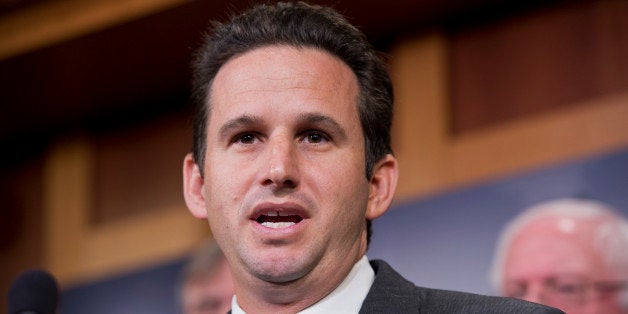 UNITED STATES - JANUARY 14: Sen. Brian Schatz, D-Hawaii, speaks during a news conference in the Capitol to announce the newly formed Senate Climate Change Task Force. (Photo By Tom Williams/CQ Roll Call)