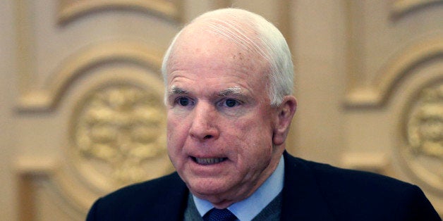 KIEV, UKRAINE - MARCH 14: United States' (US) Senator John McCain arrives to meet Ukraines Acting President and Speaker of the Parliament, Alexander Turchynov (not seen) in the capital Kiev, Ukraine on March 14, 2014. (Photo by Maksim Marusenko/Anadolu Agency/Getty Images)