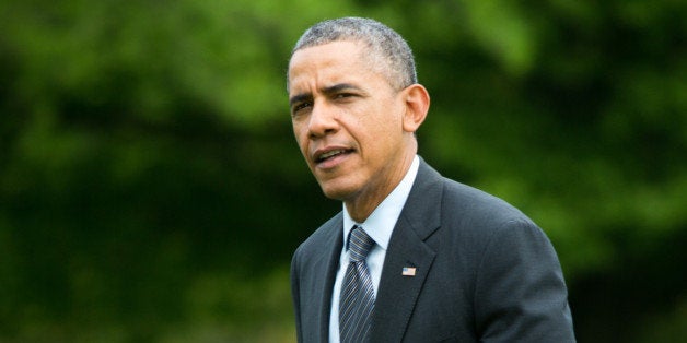 WASHINGTON, DC - MAY 9, 2014 : U.S. President Barack Obama walks from Marine One as he returns to the White House on May 9,