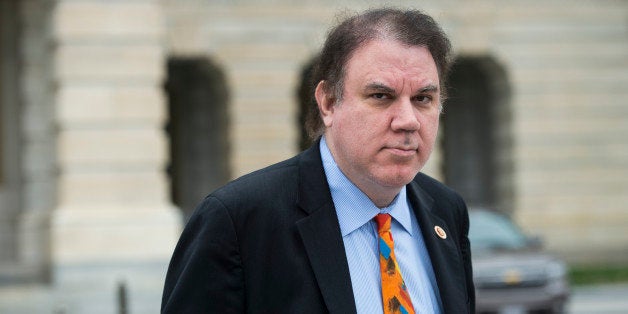 UNITED STATES - APRIL 4: Rep. Alan Grayson, D-Fla., leaves the Capitol following the last vote of the week on Friday, April 4