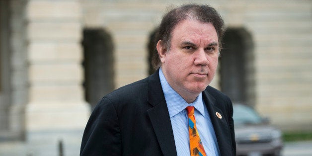 UNITED STATES - APRIL 4: Rep. Alan Grayson, D-Fla., leaves the Capitol following the last vote of the week on Friday, April 4, 2014. (Photo By Bill Clark/CQ Roll Call)