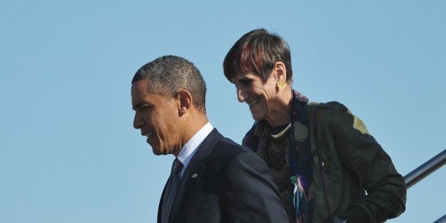 US President Barack Obama steps off Air Force One with Rep Rosa DeLauro, D-CT, Rep John Larson, D-CT, and Senator Senator Chris Murphy, D-CT, upon arrival at Bradley Air National Guard Base in Hartford, Connecticut on April 8, 2013. Obama is in Hartford to speak on gun control at the University of Hartford. AFP PHOTO/Mandel NGAN (Photo credit should read MANDEL NGAN/AFP/Getty Images)