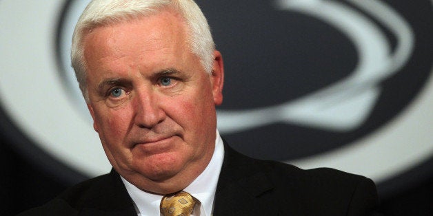 STATE COLLEGE, PA - NOVEMBER 10: Pennsylvania Governor Tom Corbett speaks at a news conference following a night of rioting in response to the firing of head football coach Joe Paterno in the wake of the Jerry Sandusky scandal on November 10, 2011 in State College, Pennsylvania. Corbett is the former state attorney general who launched the investigation in 2009 that eventually brought criminal charges against three former Penn State officials this week. As governor, Corbett is an ex-oficio member of Penn Stateâs board of trustees. Paterno was fired amid allegations that former former Penn State defensive coordinator Jerry Sandusky was involved with child sex abuse. (Photo by Mario Tama/Getty Images)