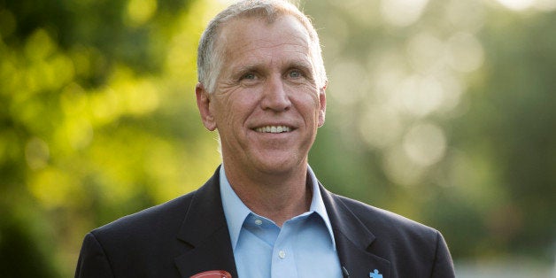 UNITED STATES - MAY 5: NC Speaker of The House and GOP Senate candidate Thom Tillis, R-NC, knocks on doors in an upscale Hunt