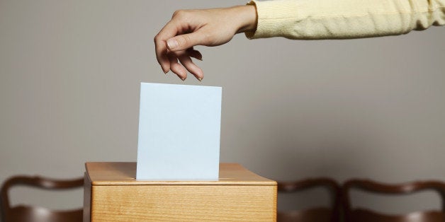 a young woman with a voter in...