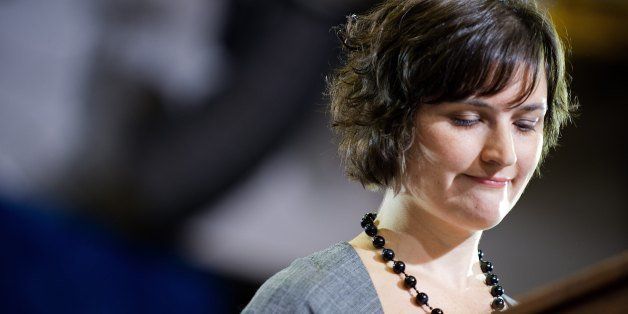 Sandra Fluke, the law student Rush Limbaugh infamously attacked because of her stances on birth control, introduces the US President during a campaign event Auraria Event Center in Denver, Colorado, August 8, 2012. AFP PHOTO/Jim WATSON (Photo credit should read JIM WATSON/AFP/GettyImages)