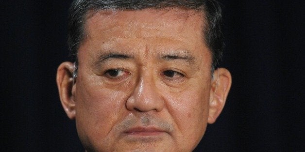 US Veterans Affairs Secretary Eric Shinseki watches as Defense Secretary Leon Panetta speaks to the media following their me