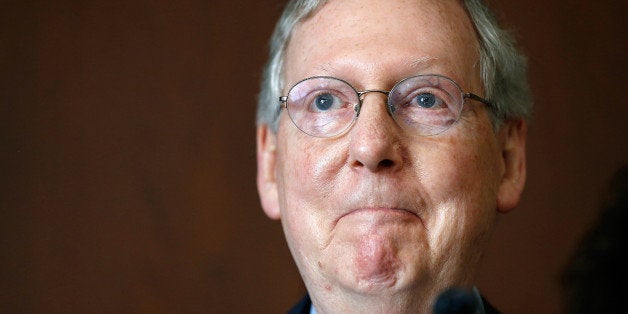 LEXINGTON, KY - MAY 19: U.S. Senate Republican Leader Sen. Mitch McConnell (R-KY) speaks to supporters at a campaign rally May 19, 2014 in Louisville, Kentucky. McConnell has a full day of campaigning scheduled in advance of tomorrow's Republican primary against challenger Matt Bevin. (Photo by Win McNamee/Getty Images)