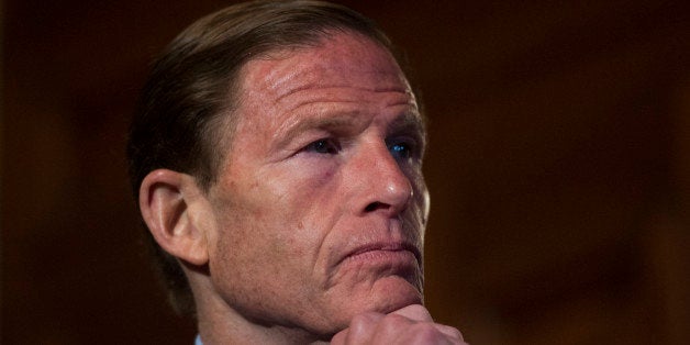 UNITED STATES - MAY 14: Sen. Richard Blumenthal, D-Conn., listens as others speak during the press conference on the Fair Shot Agenda to lower interest rates on student loan debt on Wednesday, May 14, 2014. (Photo By Bill Clark/CQ Roll Call)