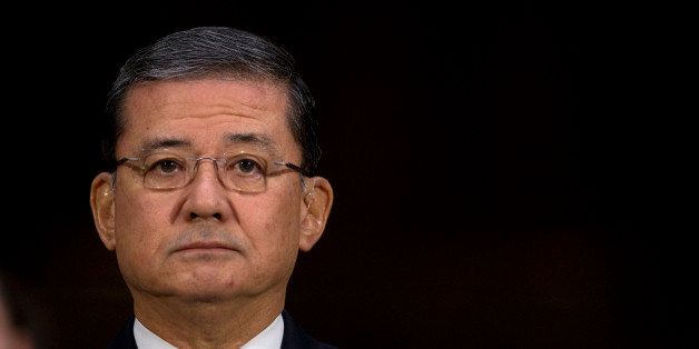 Eric Shinseki, U.S. secretary of Veterans Affairs (VA), listens during a Senate Veterans' Affairs Committee hearing in Washington, D.C., U.S., on Thursday, May 15, 2014. Shinseki said he is Ã¢mad as hellÃ¢ over allegations of treatment delays and cover-ups at VA health clinics in Phoenix and Fort Collins, Colorado. Photographer: Andrew Harrer/Bloomberg via Getty Images 
