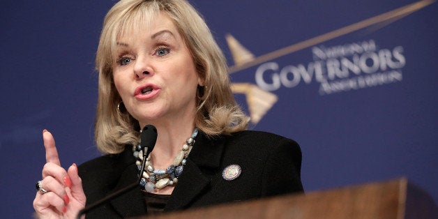 WASHINGTON, DC - JANUARY 15: National Governors Association chairwoman Gov. Mary Fallin (R-OK) speaks at the National Press Club January 15, 2014 in Washington, DC. Gov. Fallin and Gov. Hickenlooper delivered the annual 'State of the States' address prior to taking questions. (Photo by Win McNamee/Getty Images)