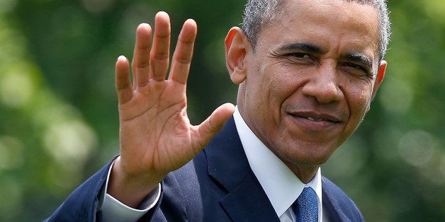 WASHINGTON, DC - MAY 28: U.S. President Barack Obama waves as he returns to the White House May 28, 2014 in Washington, DC. Obama gave a major foreign policy speech during the commencement address at West Point earlier in the day. (Photo by Win McNamee/Getty Images)