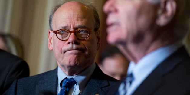 UNITED STATES - MAY 6: Rep. Steve Cohen, D-Tenn., left, and Sen. Ben Cardin, D-Md., attend a new conference with members of the Russian protest group Pussy Riot Nadya Tolokonnikova, and Maria Alyokhina, in the Capitol after a meeting to discuss the Magnitsky Act. The legislation, authored by Cardin, is intended to punish those responsible for the death of Russian lawyer Sergei Magnitsky. (Photo By Tom Williams/CQ Roll Call)