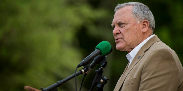 UNITED STATES - APRIL 17: Gov. Nathan Deal, R-Ga., speaks at the Law Enforcement Cookout at Wayne Dasher's pond house in Glennville, Ga., on Thursday, April 17, 2014. A crowd of over one thousand law enforcement, government officials and guests from across the state of Georgia gathered to enjoy BBQ and Brunswick stew at the annual event. (Photo By Bill Clark/CQ Roll Call)