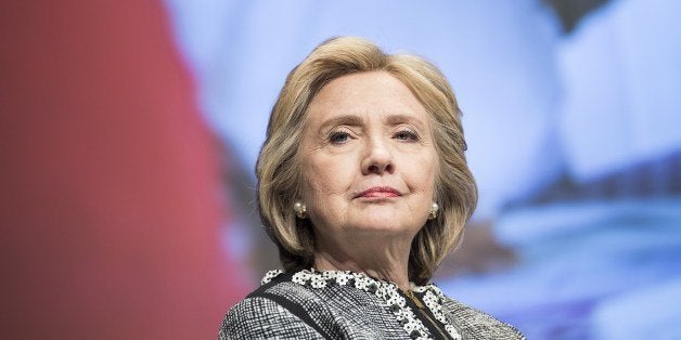 Former Secretary of State Hillary Clinton waits to speak at the World Bank May 14, 2014 in Washington, DC. Clinton and World