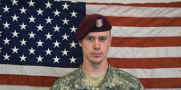 UNDATED - In this undated image provided by the U.S. Army, Sgt. Bowe Bergdahl poses in front of an American flag. U.S. officials say Bergdahl, the only American soldier held prisoner in Afghanistan, was exchanged for five Taliban commanders being held at Guantanamo Bay, Cuba, according to published reports. Bergdahl is in stable condition at a Berlin hospital, according to the reports. (Photo by U.S. Army via Getty Images)