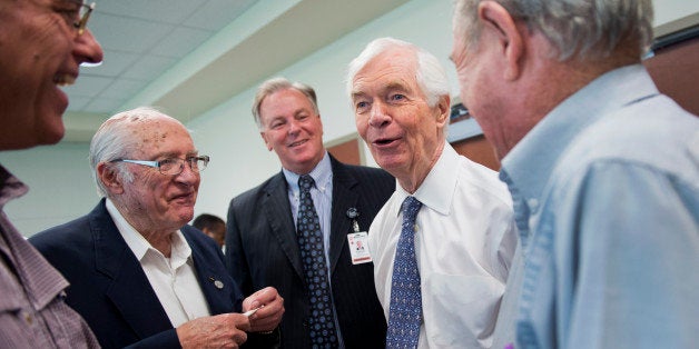 UNITED STATES - MAY 30: Sen. Thad Cochran, R-Miss., second from right, talks with Pat Woods, left, his father Tommy, David Baytos, CEO of Methodist Olive Branch Hospital, and Leamon Malone, right, during a tour of the facility in Olive Branch, Miss., May 30, 2014. (Photo By Tom Williams/CQ Roll Call)