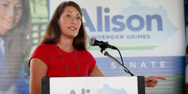 FRANKFORT, KY - MAY 19: U.S. Senate candidate and Kentucky Secretary of State Alison Lundergan Grimes (D-KY) speaks while campaigning in advance of the state's Democratic primary May 19, 2014 at Lakeview Park in Frankfort, Kentucky. A recent 'Bluegrass Poll' by the Louisville Courier-Journal showed Grimes in a virtual tie with the incumbent, Senate Republican Leader Mitch McConnell (R-KY). (Photo by Win McNamee/Getty Images)